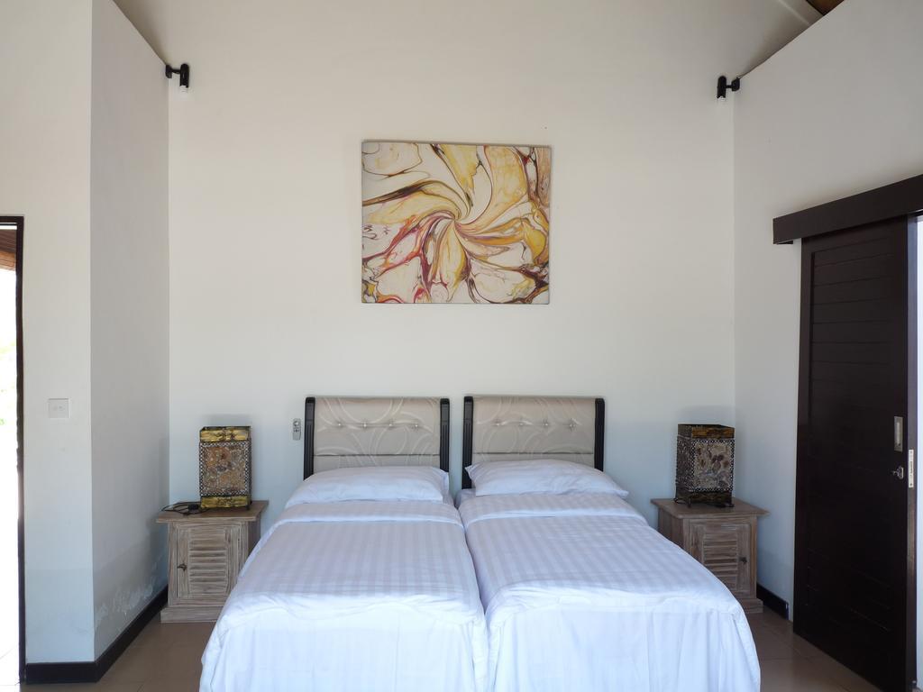 Taman Dewi Sri Villa Et Bungalow Pemuteran  Phòng bức ảnh
