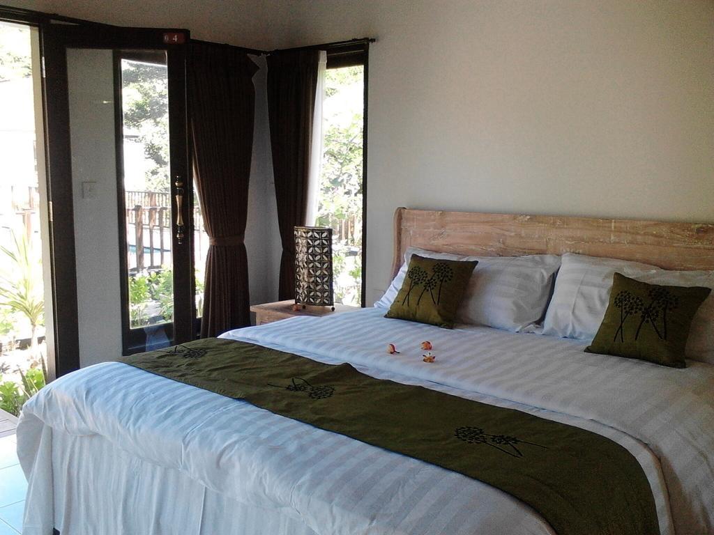 Taman Dewi Sri Villa Et Bungalow Pemuteran  Phòng bức ảnh